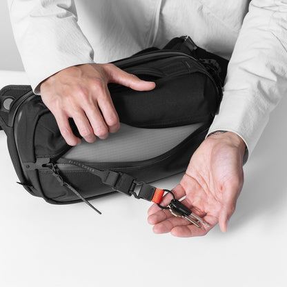 https://cdn.shopify.com/s/files/1/0970/4200/files/best-sling-bag-for-men-02.jpg?v=1765309494
