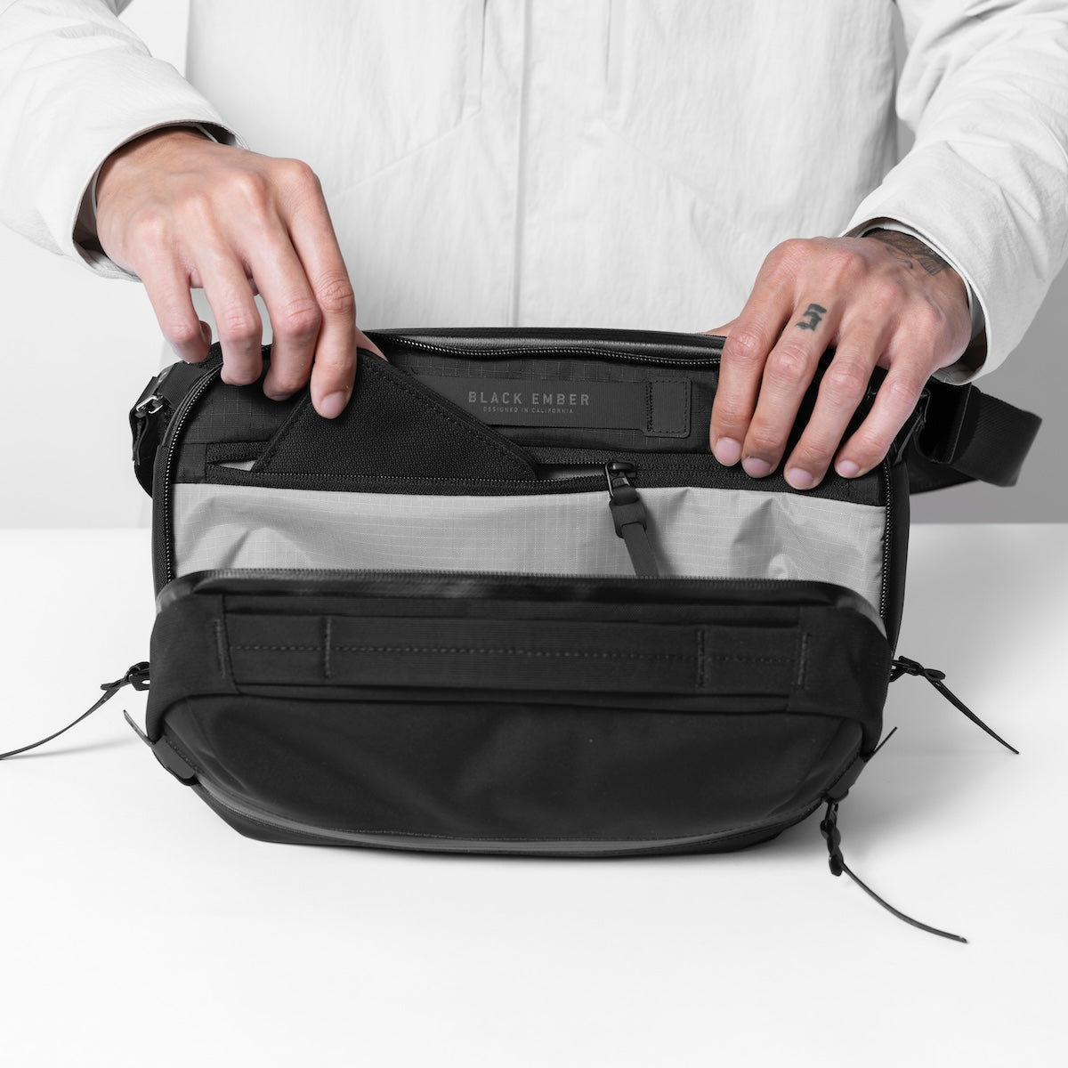 https://cdn.shopify.com/s/files/1/0970/4200/files/best-sling-bag-for-men-13.jpg?v=1765309494