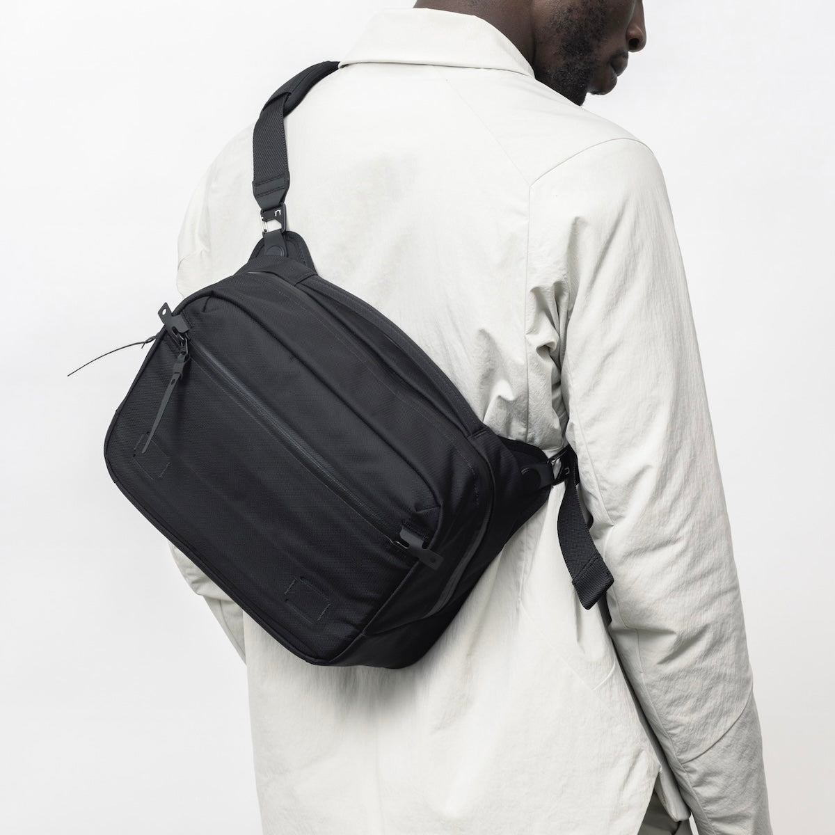https://cdn.shopify.com/s/files/1/0970/4200/files/sling-bag-for-men-100.jpg?v=1740115683