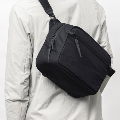 https://cdn.shopify.com/s/files/1/0970/4200/files/sling-bag-for-men-101.jpg?v=1740115683