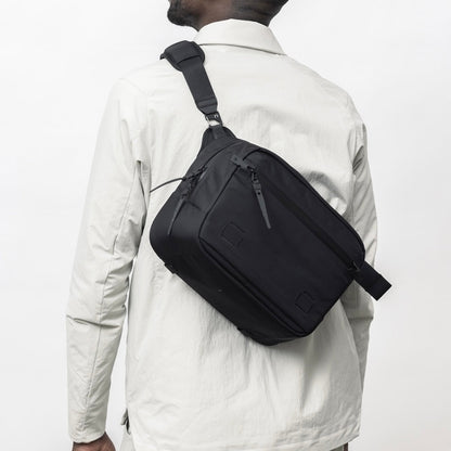 https://cdn.shopify.com/s/files/1/0970/4200/files/sling-bag-for-men-103.jpg?v=1740115683
