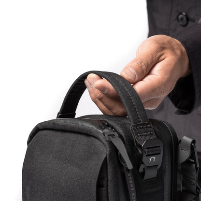https://cdn.shopify.com/s/files/1/0970/4200/products/small-mens-crossbody-bag_1d5e7e26-a004-4cfd-a591-774a214e4287.jpg?v=1701406393